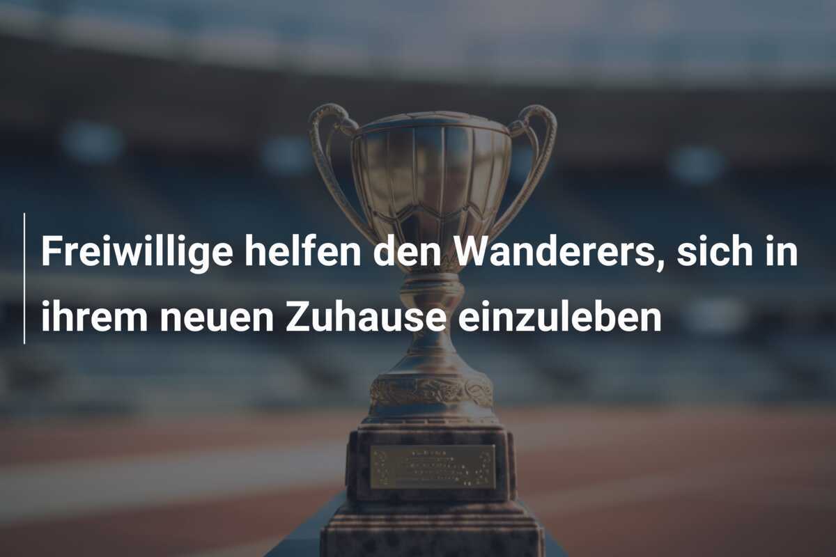 Freiwillige helfen den Wanderers, sich in ihrem neuen Zuhause einzuleben