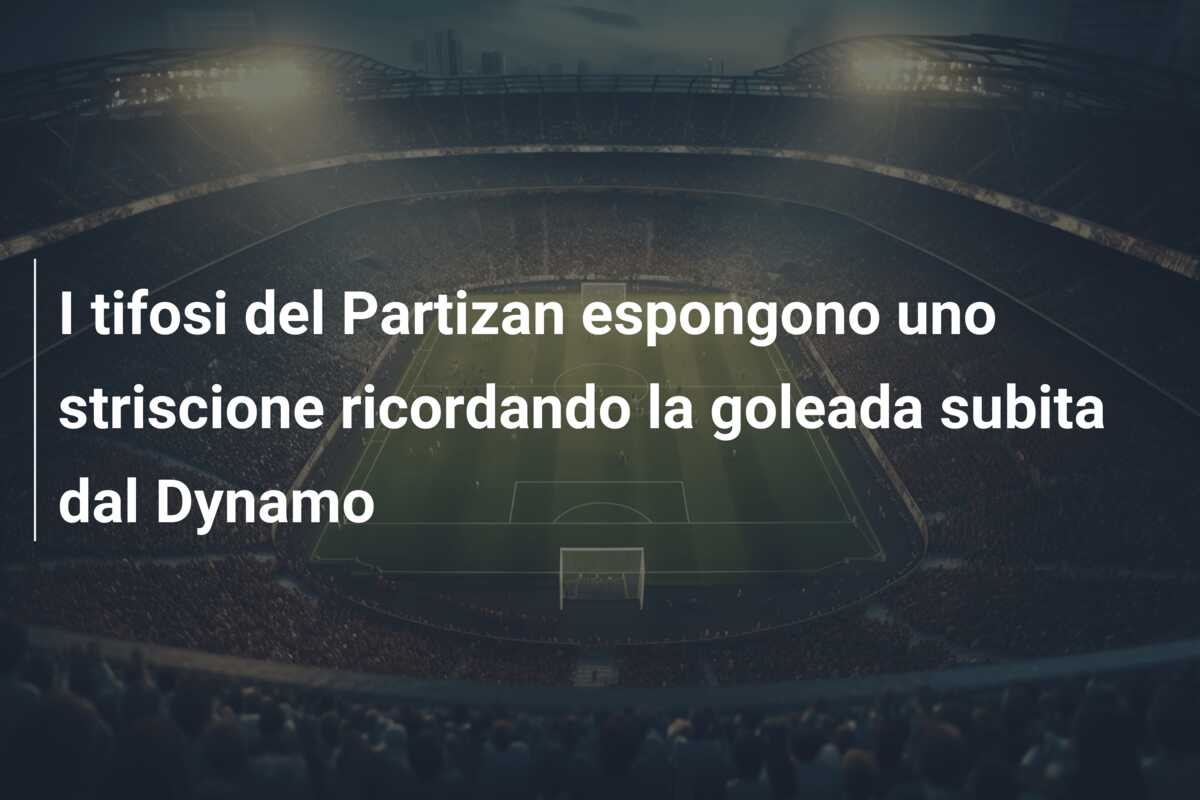 I tifosi del Partizan espongono uno striscione ricordando la goleada subita dal Dynamo