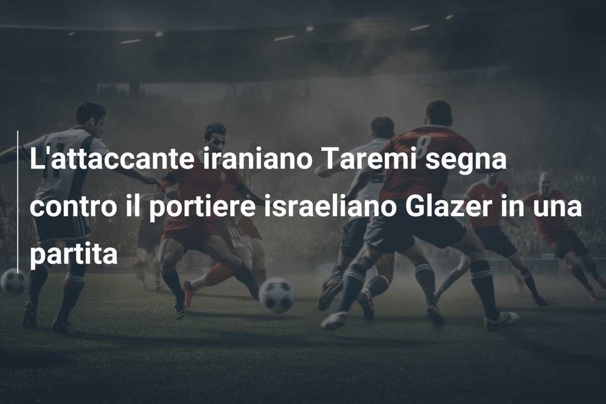 L'attaccante iraniano Taremi segna contro il portiere israeliano Glazer in una partita